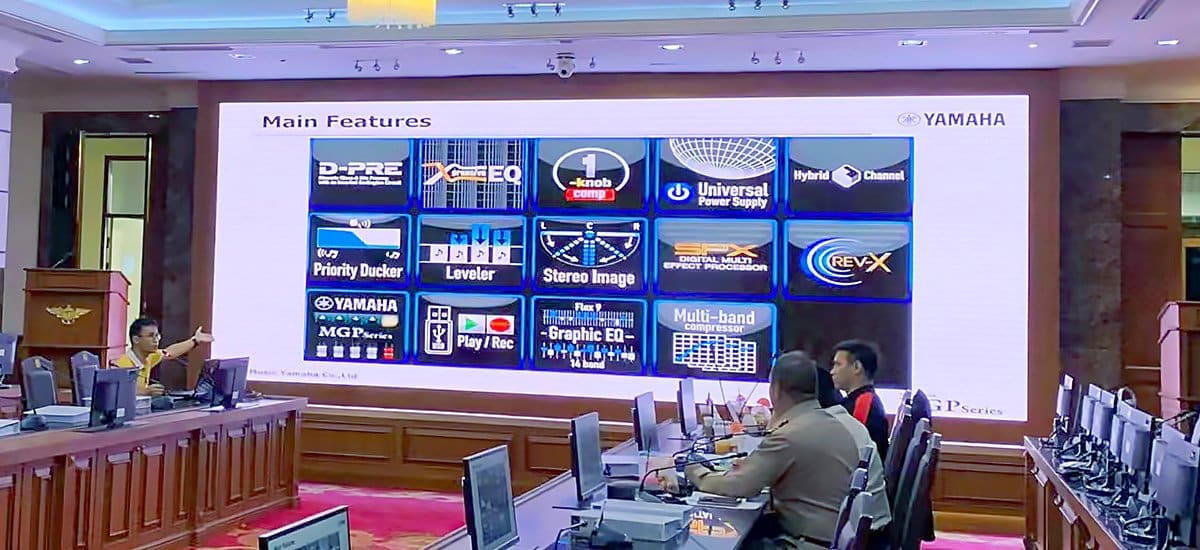 Indoor LED video wall displaying presentation slides in a conference room