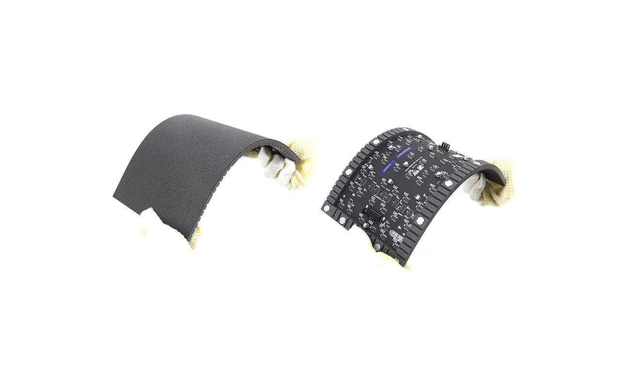 Bendable LED module showing the curved surface used in a soft-module display